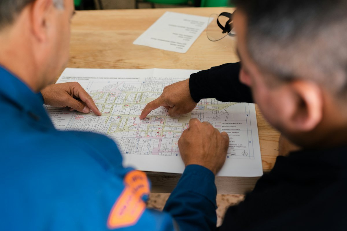 Engineers reviewing project plans